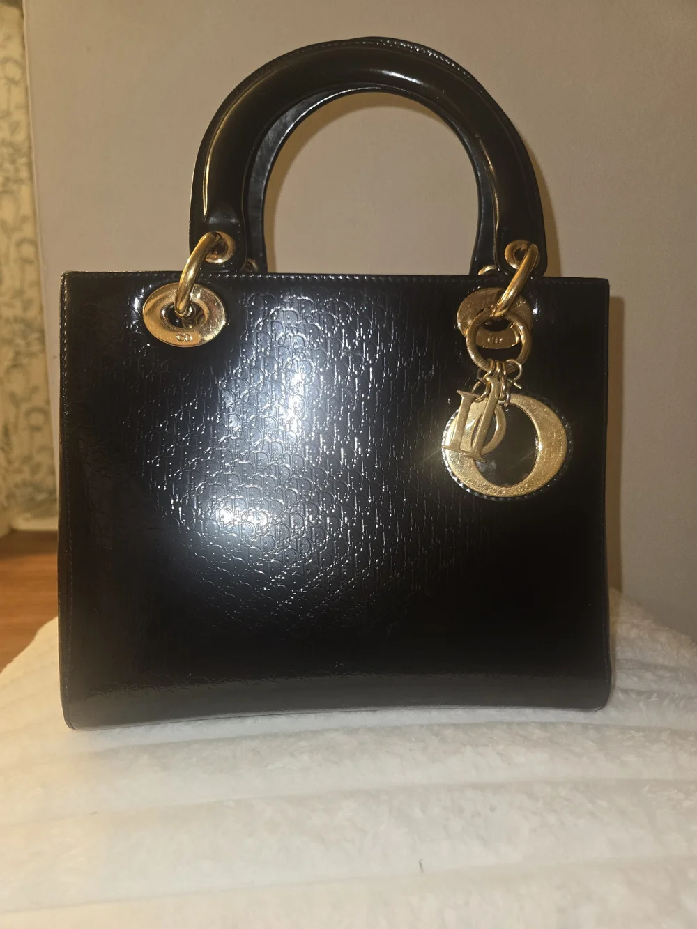 Black Structured Patent Leather Top-Handle Bag with Gold Hardware
